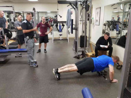 Law enforcement officers exercising in a group. 